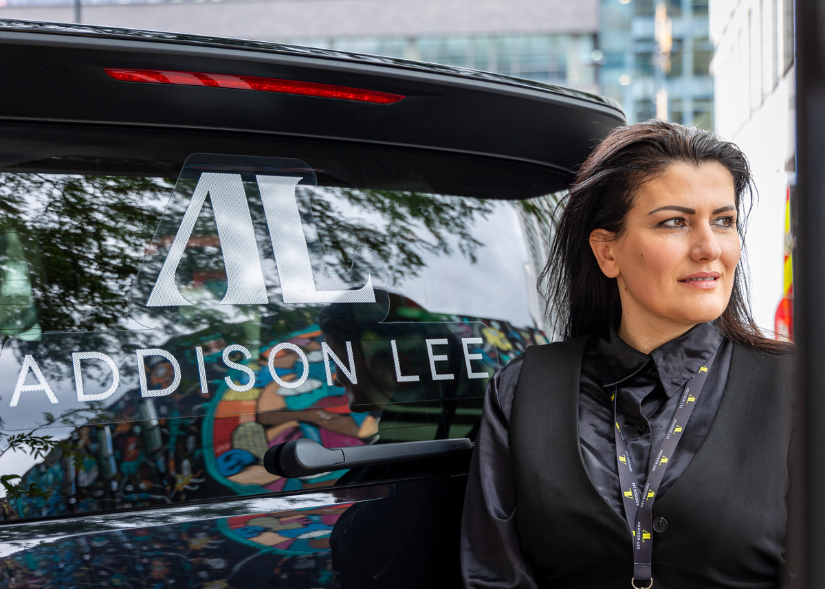 Addiosn lee driver at the back of car