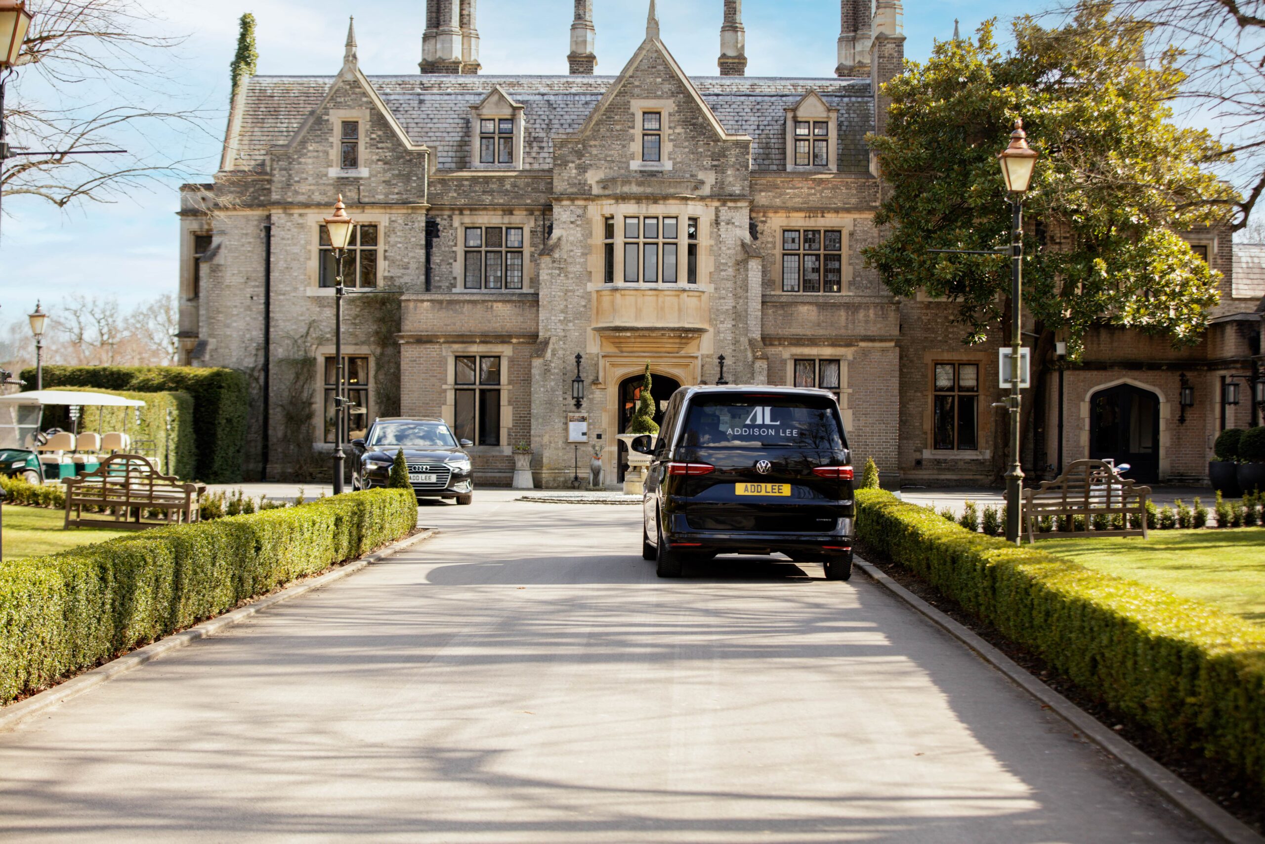 Addison Lee car parked in front of Foxhills resort